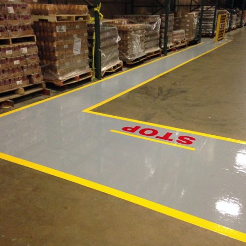 Line painting service of yellow lines inside warehouse